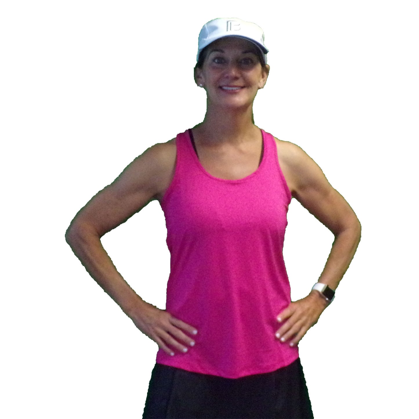 "Woman in pink tank top and white visor smiles with hands on hips before workout"