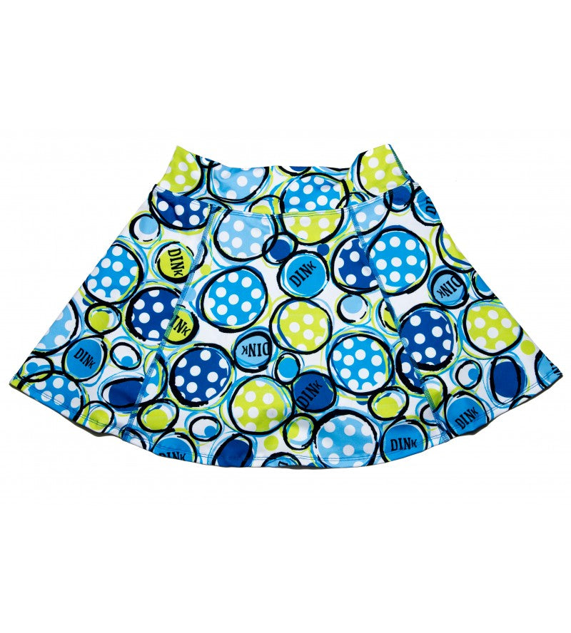 Girl's white athletic skirt with blue and green polka dot and bubble print.