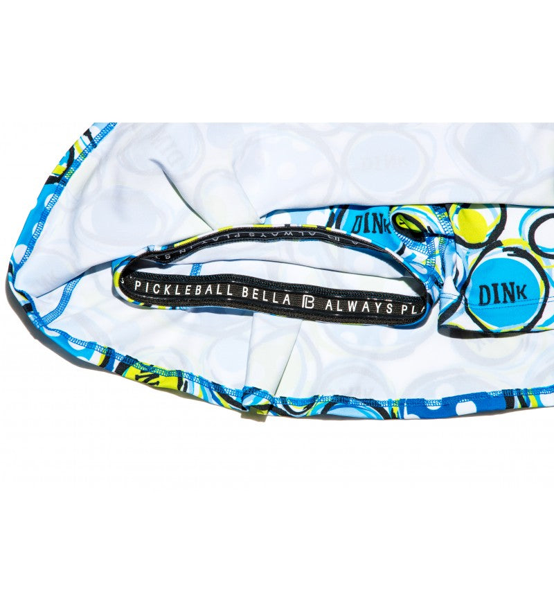 Close-up of pickleball apparel showcasing the brand name "Pickleball Bella" and the slogan "Always Play" printed on the inner waistband.