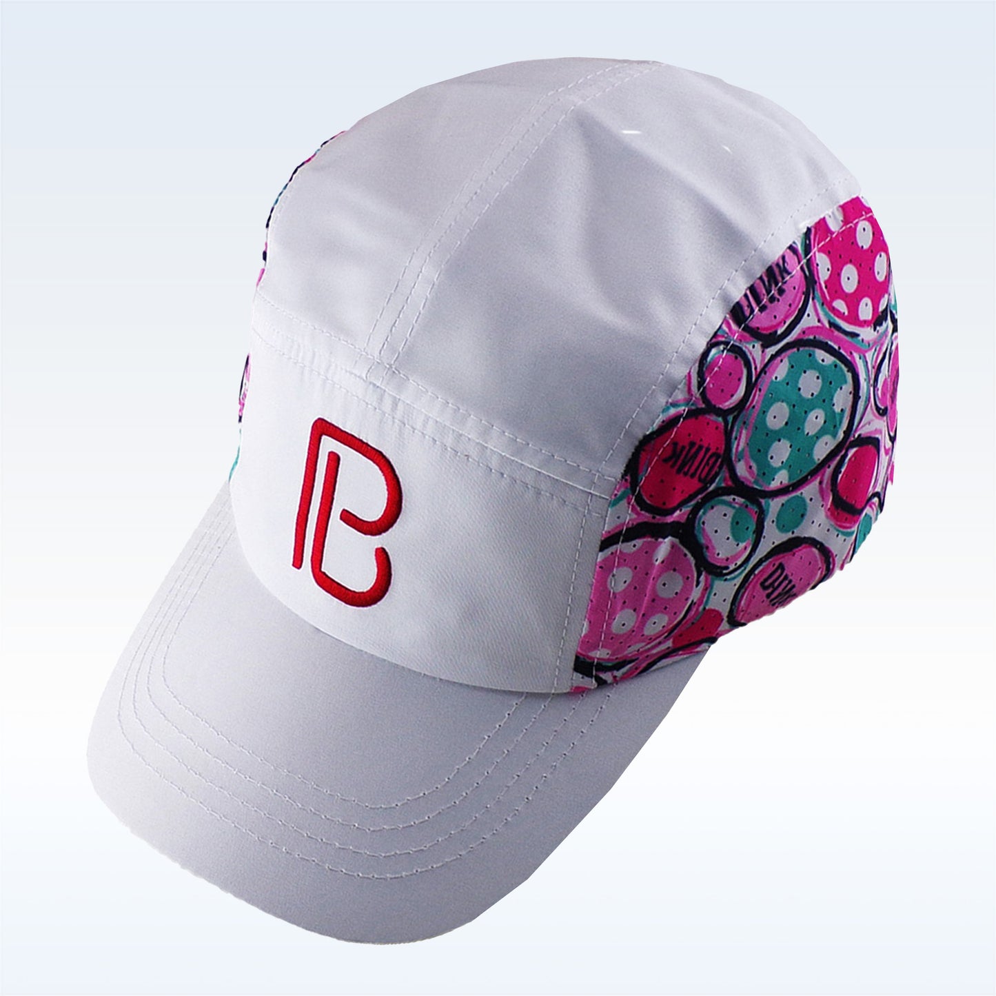 White baseball cap with pink and teal abstract pattern and red "B" logo.